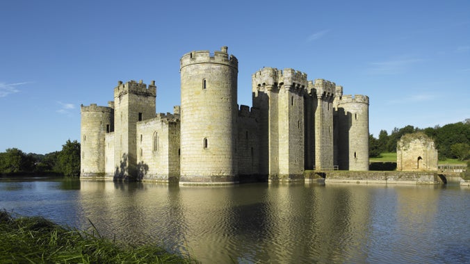 The East Range and North Range with the Gatehouse and bridge to Bodiam Castle, East Sussex, built between 1385 and 1388.
